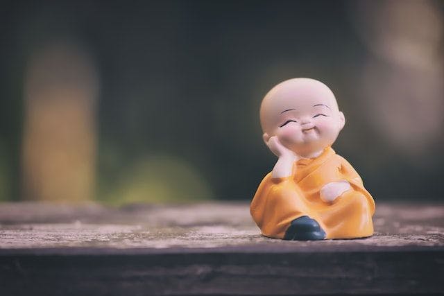 Happy little Buddha figure